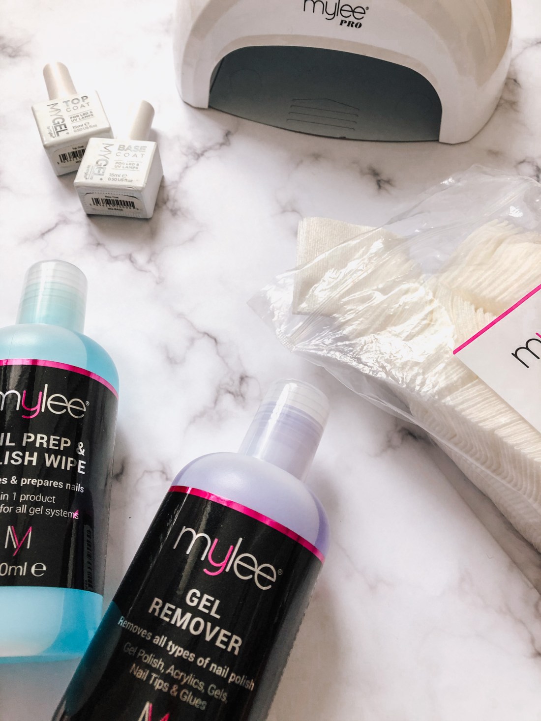 Mylee Pro LED lamp, lint-free wipes, base and top coats, Prep + Polish and gel remover.